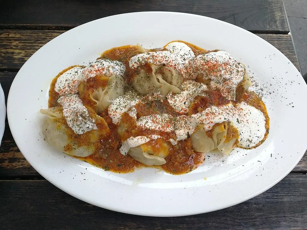 Mantu (Manto), 1. Kabuli Pulao, 2. Mastawa, 3. Lavash, 4. Maas Pulao, 5. Bolani, 6. Chopan Kabob, 7. Mantu (Manto), 8. Kofta Challow, 9. Shord Nakhod, 10. Aush