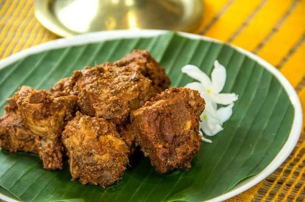 Fish Ambul Thiyal, 1. Kottu, 2. Fish Ambul Thiyal, 3. Parippu, 4. Polos, 5. Kadala Thel Dhala, 6. Lamprais, 7. Gotukola Sambol, 8. Kalu Pol Wattakka, 9. Kukul Mas Kari, 10. Idiyappam