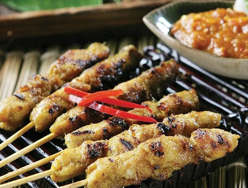 Malaysian Chicken Satay, 1. Roti Canai Tissue with Milk and Cheese, 2. Roti Canai with Chicken Curry, 3. Fried Tofu Negeri Jiran, 4. Malay Mee Goreng, 5. Malaysian Chicken Satay, 6. Mango Chicken, 7. Clay Pot Curry Prawn, 8. Singapore Laksa Udon, 9. Durian Chendol, 10. Teh Tarik Frappe