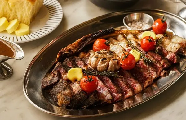 Tokusen Wagyu 65-Day Dry-Aged Tomahawk Steak, 1. Goma Ikura Grilled Salmon, 2. Grilled Scallop and Corn Velouté, 3. Mie Kangkung, 4. Miso Glazed Octopus Salad, 5. Garlic Lobster Noodle, 6. Stockyard Prime Rib, 7. Classic American Roast Turkey, 8. Misua Rawon, 9. Smoked Salmon &amp; Avocado Toast, 10. Steak Diane, 11. Tokusen Wagyu 65-Day Dry-Aged Tomahawk Steak