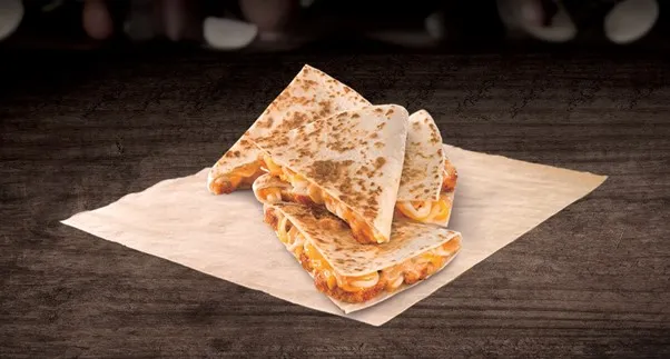 Chicken Quesadilla, 1. Taco Supreme, 2. Crunchwrap Supreme, 3. Chicken Quesadilla, 4. Naked Chicken Burrito, 5. Grilled Stuffed Burrito, 6. Kickin’ Chicken Taco, 7. Chickstar, 8. Bell Rice