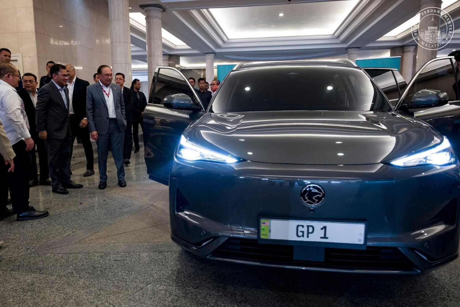 Anwar Ibrahim test drives Proton eMas 7, calls it a proud achievement of Malaysian automotive landscape