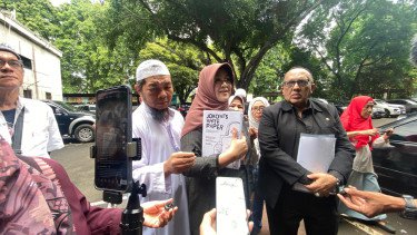 Bawa Buku Jokowi White Paper, Dokter Tifa Tantang Pemeriksaan Polisi