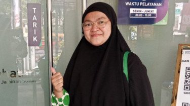 Dengan Program JKN, Dewi Nikmati Perawatan Gigi Nyaman