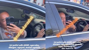 Polisi Pangkat AKBP Viral Merokok Saat Nyetir Akhirnya Minta Maaf: Saya Sedang Lelah