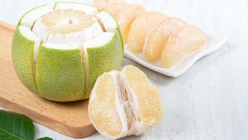 Close up of fresh peeled pomelo on white table background for Mid-Autumn Festival fruit&amp;period;