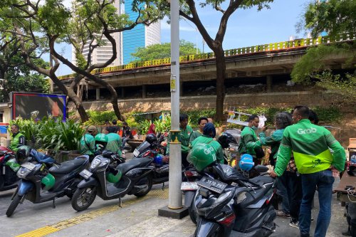 kesejahteraan pengemudi, aplikasi transportasi online, pengemudi transportasi daring, status kerja driver, Ketidakadilan Pengemudi Transportasi Daring di Indonesia