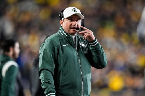 As Michigan State AD J Batt golfs in Detroit, Jonathan Smith revs up football recruiting