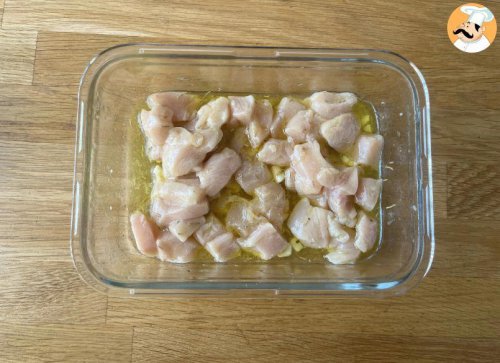Rice salad with chicken, zucchini, pine nuts and balsamic vinegar