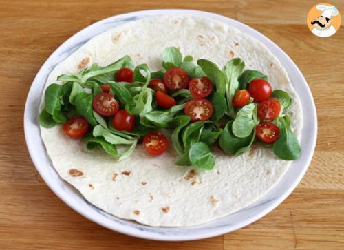 Chorizo, avocado, and tomato wrap sandwich