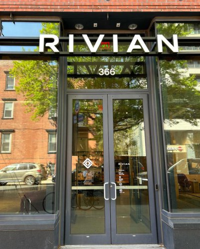 I visited a Rivian and Tesla showroom in NYC. Their vibes couldn't be more different.