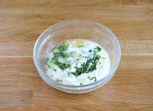 Marinated chicken skewers in yogurt lemon sauce