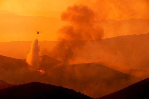 See firefighters battle Wolf Fire in Southern California as residents evacuate