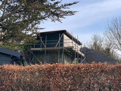 Airbnb owner ordered to tear down 40ft 'prison camp watchtower' from his garden