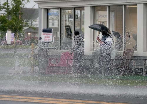 Heavy rains bring flooded streets in coastal Monmouth, Ocean; thunderstorms possible