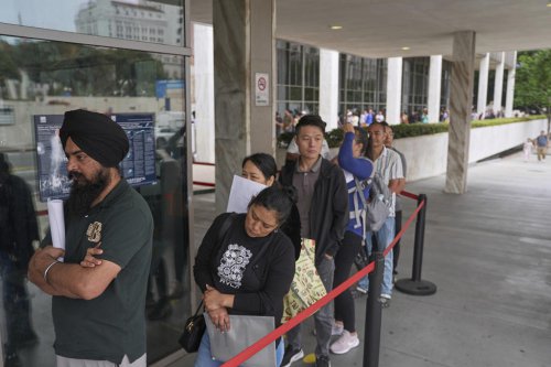 A day outside an LA detention center shows profound impact of ICE raids on families