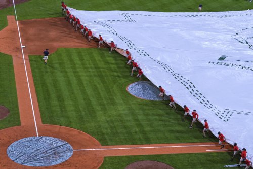 Reds and Red Sox suspended because of rain, will finish as part of day-night doubleheader Wednesday