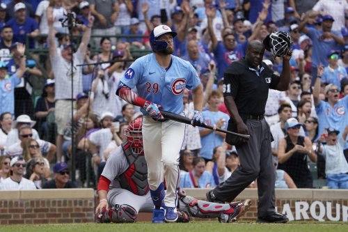 Busch hits 3 homers and Cubs set club record with 8 in 11-3 rout of Cardinals