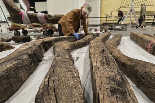 A Revolutionary War-era boat is being painstakingly rebuilt after centuries buried beneath Manhattan