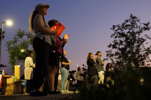 'We are not alone!' San Gabriel Valley residents gather at candlelight vigil to protest ICE raids
