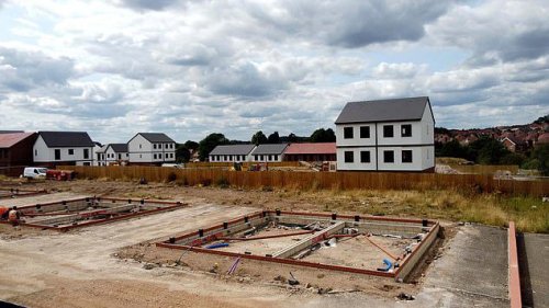 Residents left staring at building site after 50 abandoned houses demolished when builder went bust