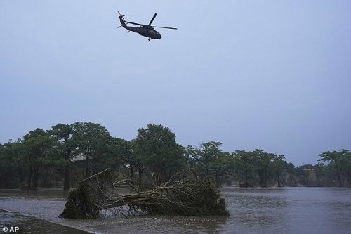 Texas river flood kills 24 with dozens more swept away from girls' summer camp