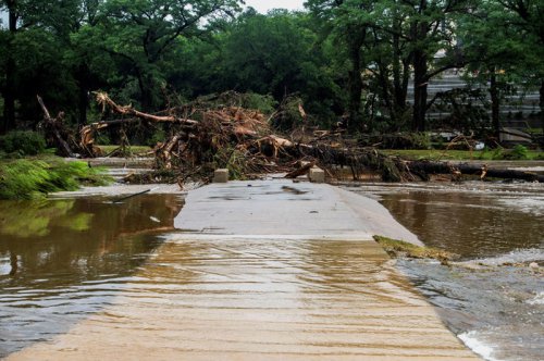 Texas flooding latest: 14 children among 32 dead while frantic search continues for missing summer camp girls