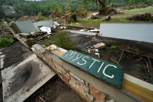 Race on to rescue 11 campers still missing in floods