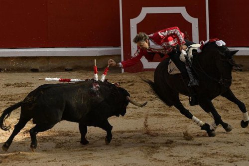 Spain's San Fermin bull-running festival begins with a firework blast looking to 'Free Palestine'
