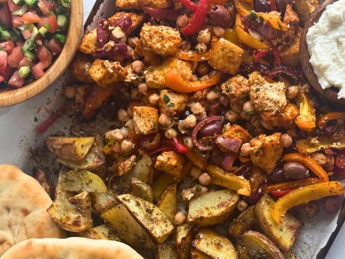 These stuffed pita pockets are a crowd pleaser, This hearty Italian dinner feels like comfort food, This Caprese-inspired sheet-pan meal feels fancy, but it's foolproof, These Mediterranean-inspired cauliflower nachos are satisfying and guilt-free, Baked ravioli is my family's favorite way to eat pasta, I'm a professional meal planner. These 5 easy sheet-pan dinners cost less than $20 and feed my whole family.