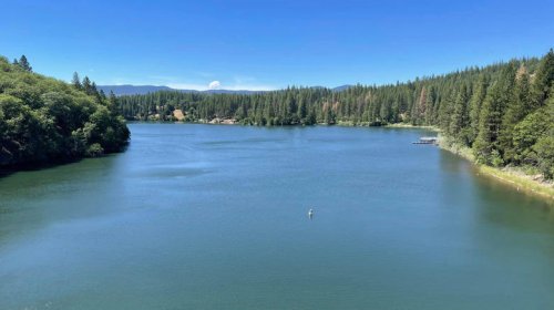 California's Peaceful Lake In The Shadows Of McArthur Burney State Park Is A Dazzling Sight With Kayak Coves