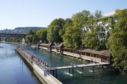 The Swiss city where commuters swim from work is perfect for a heatwave summer