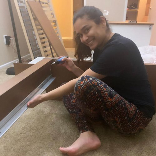My husband, our newborn, and I live in my 110-square-foot childhood room in my parents' home. We want more space, but can't afford it.