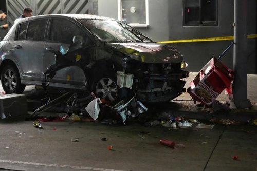At least 30 injured after car plows into crowd outside music venue