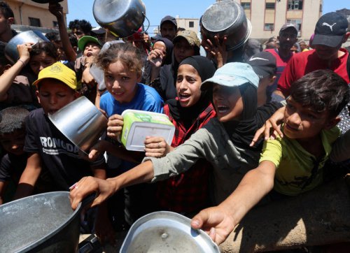 Pope Leo XIV condemns &lsquo;barbarity&rsquo; of Gaza war as dozens reported killed queuing for aid