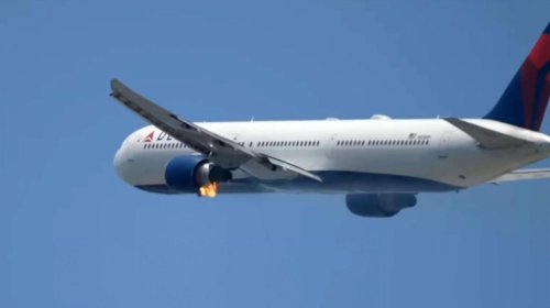 Engine of Boeing passenger plane bursts into flames during take-off