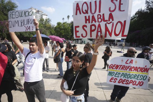 Mexico's president calls march against mass tourism 'xenophobic.' Critics blame government failures