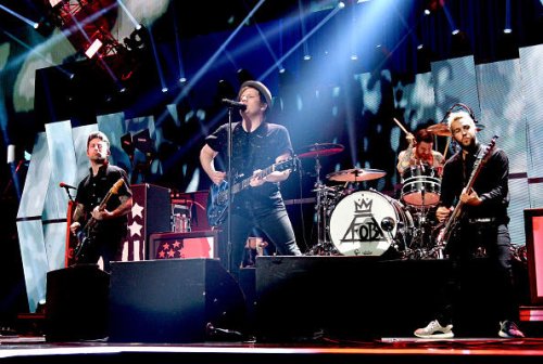 Fall Out Boy star steps away over hand injury fears