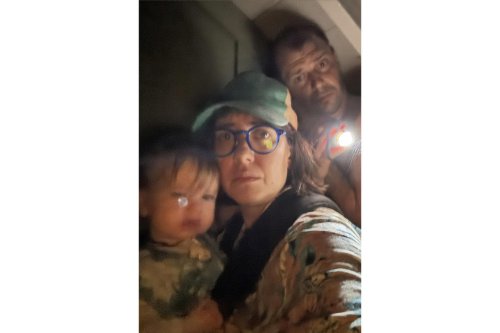 A Texas family clung to life on their roof, capturing the terrifying flooding in photos and video