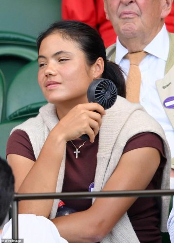 Emma Raducanu shows Leonardo DiCaprio how it's done! British star keeps cool on Centre Court