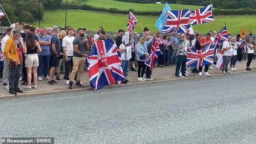 Protest outside construction site of a &pound;2.5million mosque sees police called as rival factions clash