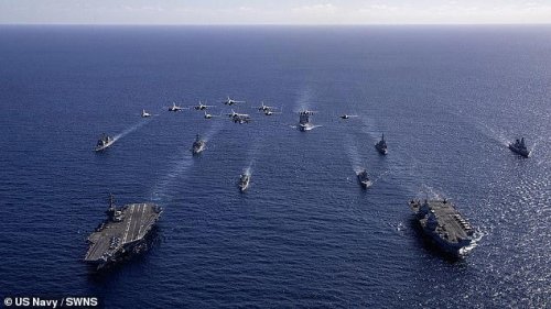 UK and US aircraft carriers steam through Pacific in display of combined military might