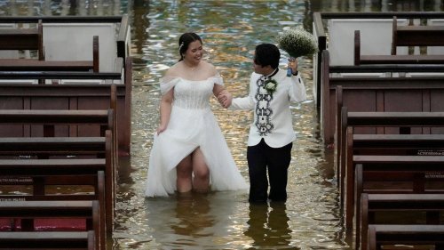 Filipino Couple Gets Married In Flooded Church In Typhoon Wipha's Aftermath