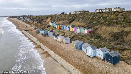Local council removes &pound;1million cliffside beach huts at risk of falling into the sea