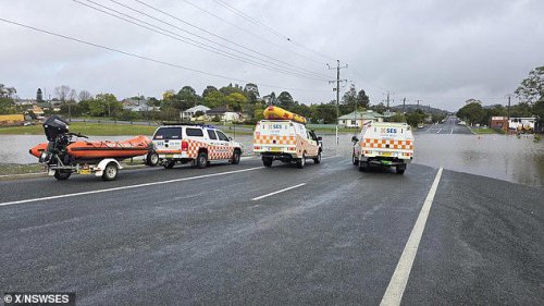 Search suspended for woman, 26, lost in floodwaters in NSW as residents are told to evacuate