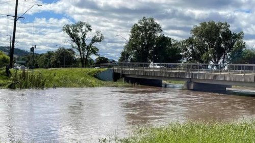 Urgent search for woman missing in floods