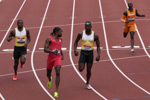 Contact on the track, as Lyles shoved by Bednarek after his win in 200 meters at US nationals