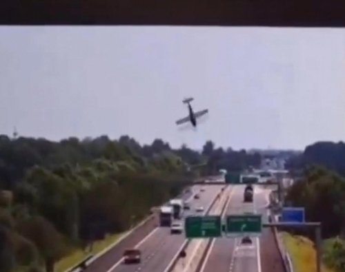 Plane crashes onto busy motorway exploding into a fireball