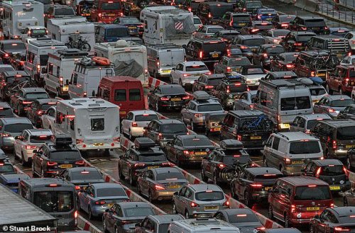 Great getaway gets stuck: Holidaymakers queue for up to an hour at Dover as summer holidays begin