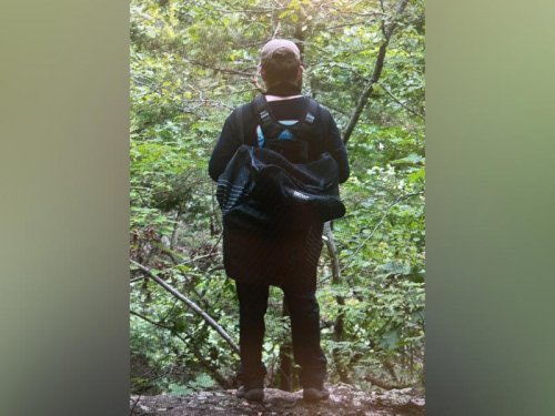 Person of interest sought after couple killed while hiking with their children